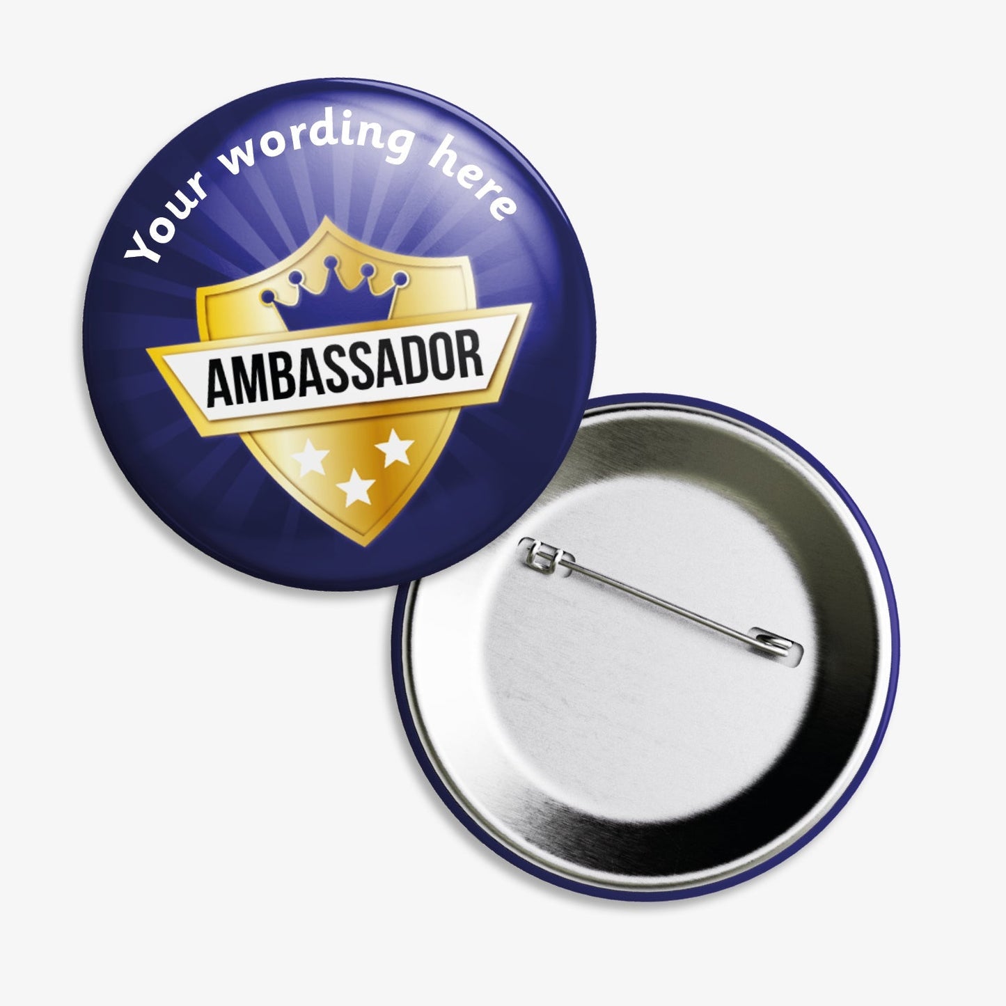 Set of ten 38mm round personalised badges featuring a shield design with a gold crown and stars on a deep blue background; includes customisable white text above and below the shield, equipped with safety pin fastenings—ideal for recognising pupil ambassadors.