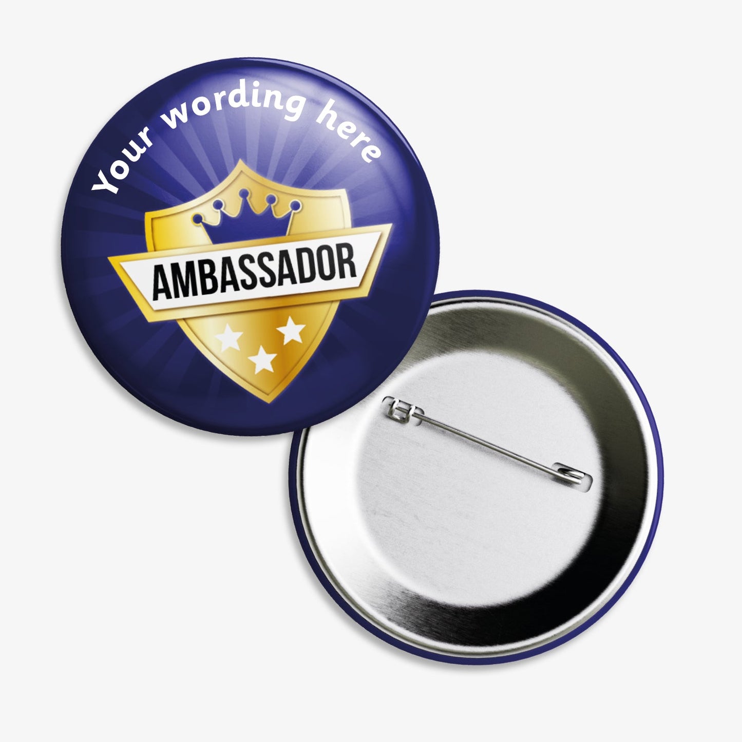 Set of ten 50mm round personalised badges featuring a shield design with a gold crown and stars on a deep blue background; includes customisable white text above and below the shield, equipped with safety pin fastenings—ideal for recognising pupil ambassadors.