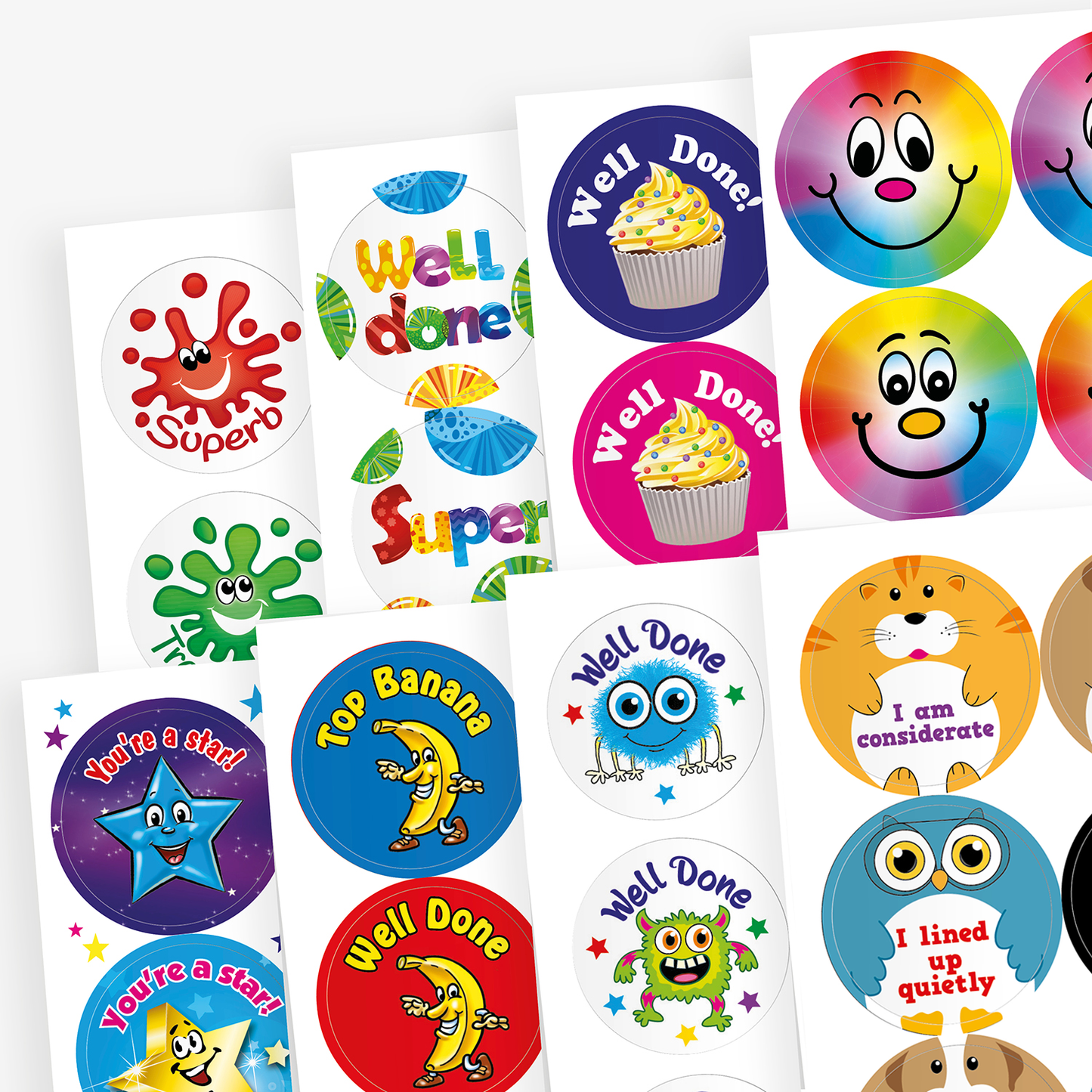 Assorted 32mm circular scented reward stickers, each featuring vibrant designs and motivational phrases such as 'Well Done', 'Great Effort', and 'You're a Star'. The stickers depict colourful illustrations including smiling stars, cheerful monsters, and sweet treats, each infused with scents like chocolate, vanilla, berry, banana, bubblegum, and jellybean.