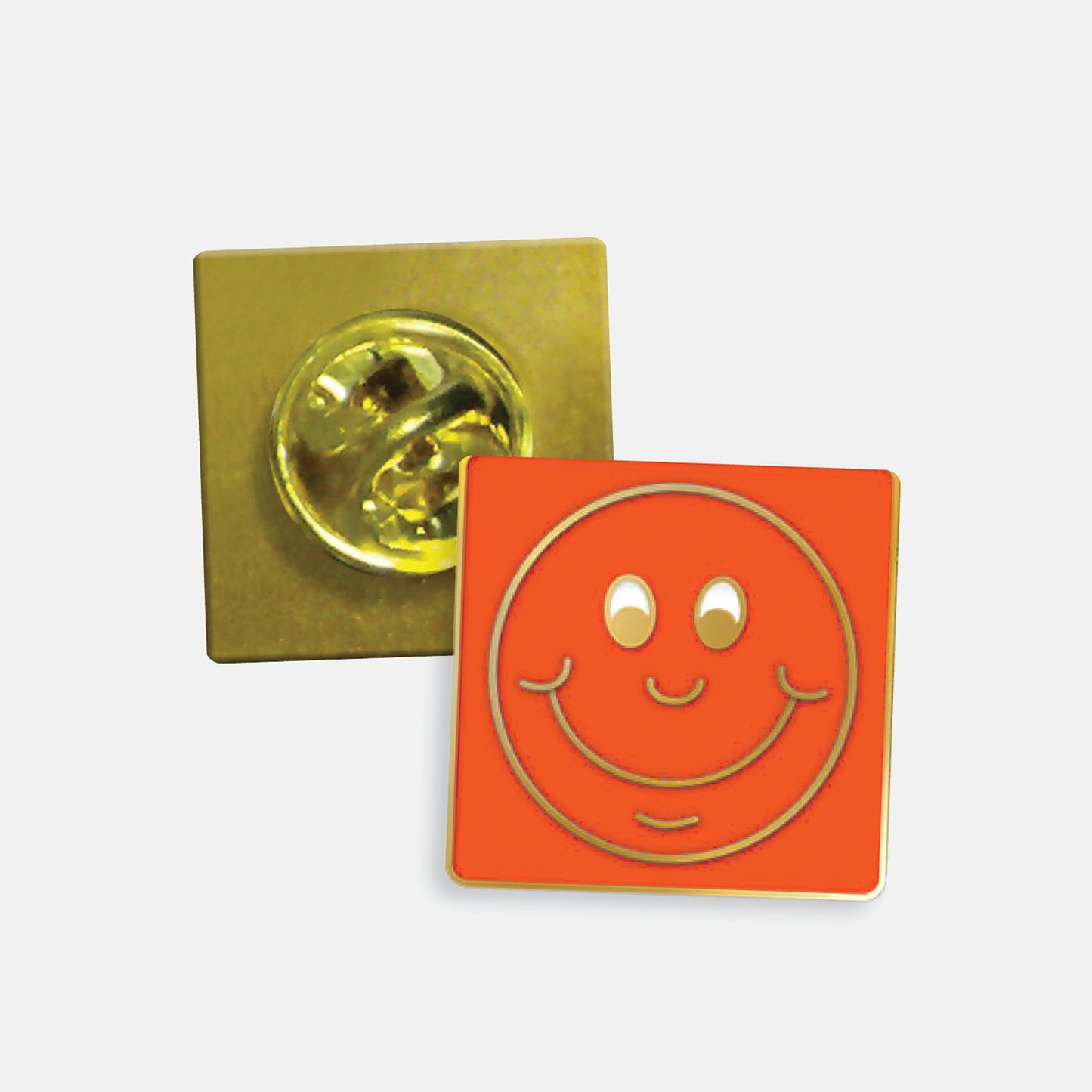 Orange enamel square badge with a gold smiling face as it's design. The reverse side shows a gold back with a butterflyfastening
