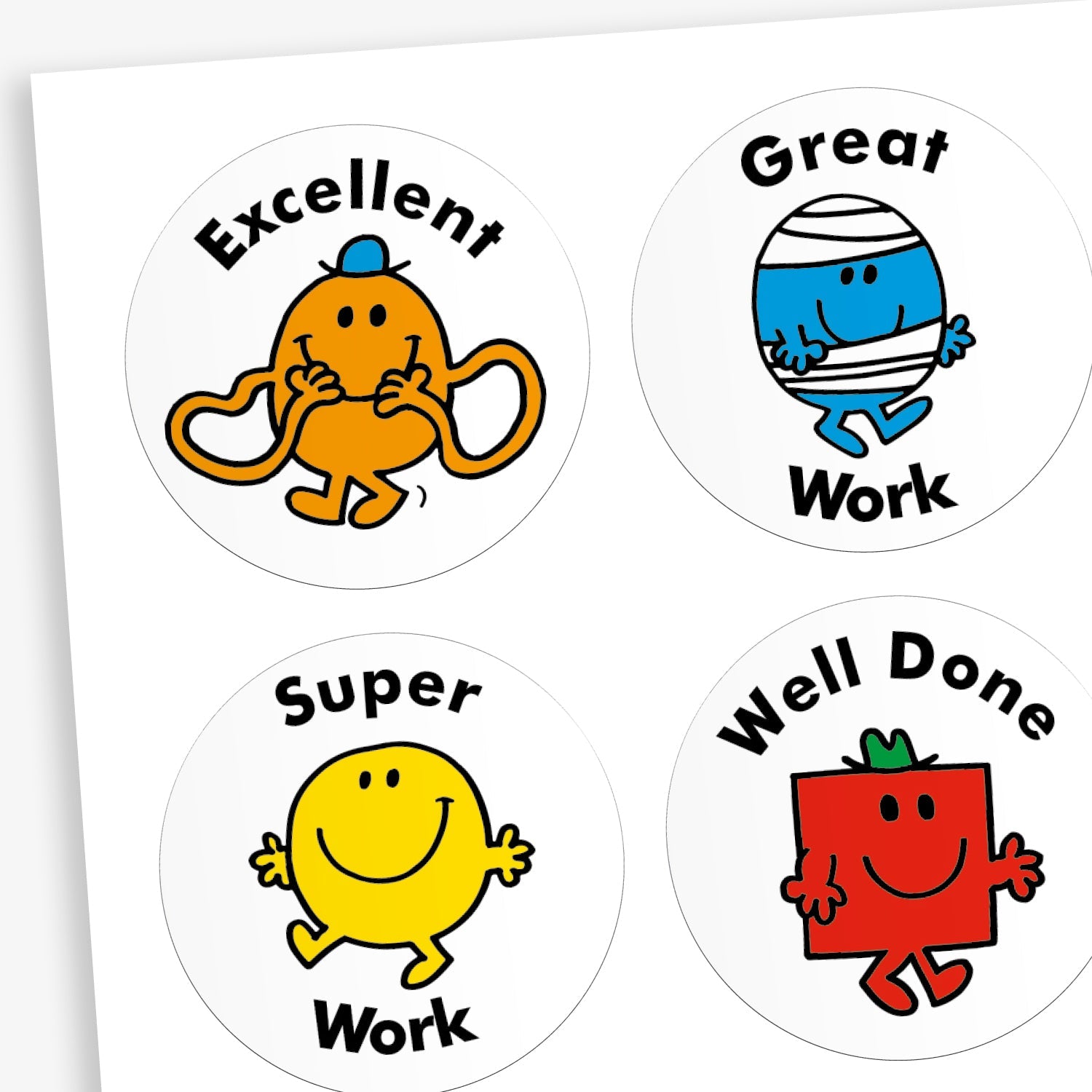 A snapshot of a sheet of circular reward stickers featuring Mr. Men and Little Miss characters on a white background.  Each sticker includes praising phrases 'Great Work', 'Well Done', 'Excellent' and 'Super Work' along with different Little Miss or Mr Men characters.