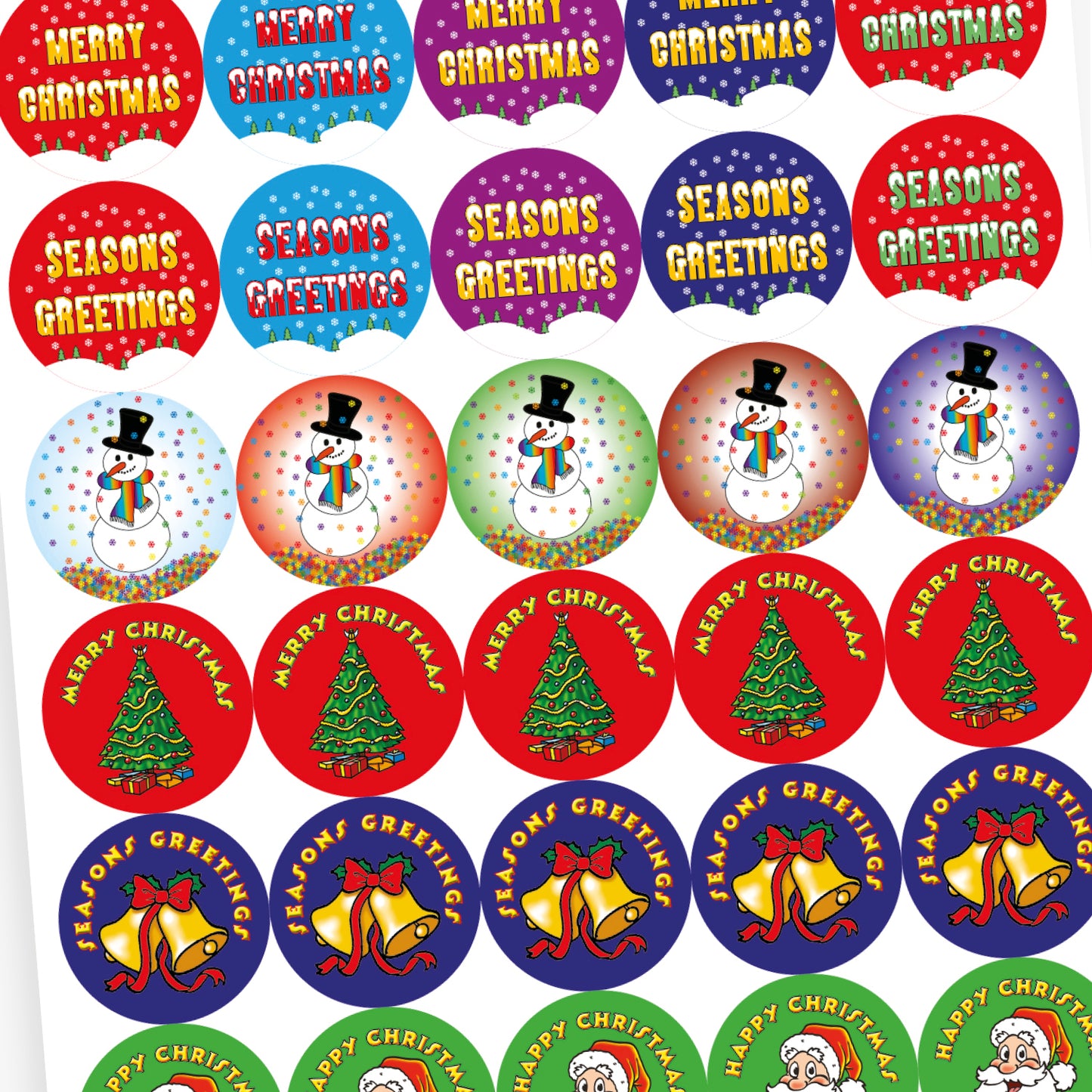 Overview of a sheet of circular Christmas-themed stickers. Designs include: gold bells with a red ribbon and 'Season’s Greetings' text on a blue background; Santa Claus with 'Happy Christmas' on green; white 'Merry Christmas' text on red with snowflake patterns; and a smiling snowman with a rainbow scarf and top hat on a snowy purple background