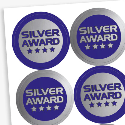 Sheet of 35, 37mm circular stickers with a metallic silver finish; each sticker features the text 'SILVER AWARD' above 4 stars.  The sheet has 50% stickers with a silver base and blue text, and 50% a blue base with silver text.