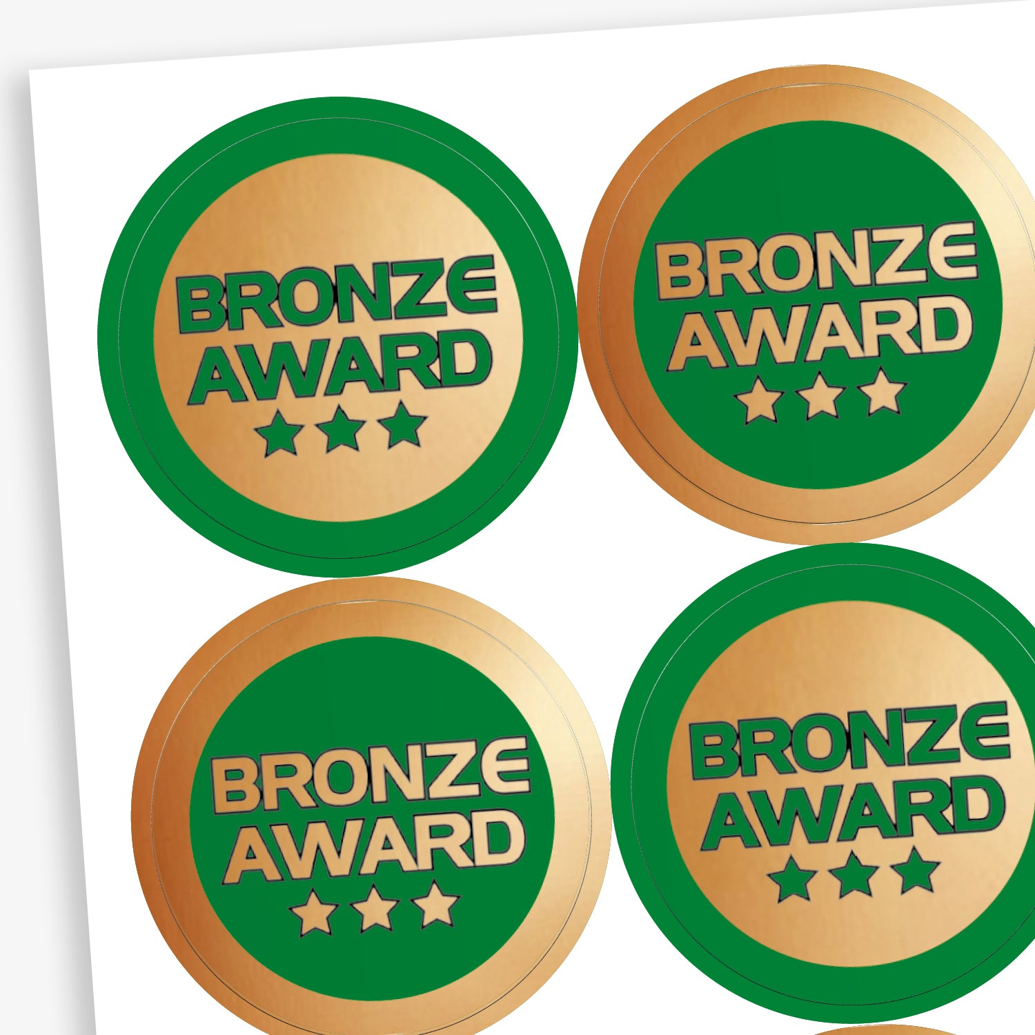 Sheet of 35, 37mm circular stickers with a metallic bronze finish; each sticker features the text 'BRONZE AWARD' above 3 stars.  The sheet has 50% stickers with a bronze base and green text, and 50% a green base with bronze text.