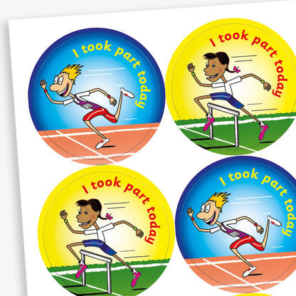 Sheet of circular stickers with bright coloured backgrounds all saying 'I took part today'.  Yellow and blue backgrounds show an athlete crossing the finish line