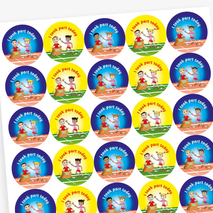 Full overview of a sheet of circular stickers with bright coloured backgrounds all saying 'I took part today'.  Yellow and blue backgrounds show an athletes partaking in the 'egg and spoon race' and also the 'sack race'