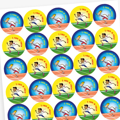 Full overview of a sheet of circular stickers with bright coloured backgrounds all saying 'I ran a race'.  Yellow and blue backgrounds show an athlete crossing the finish line