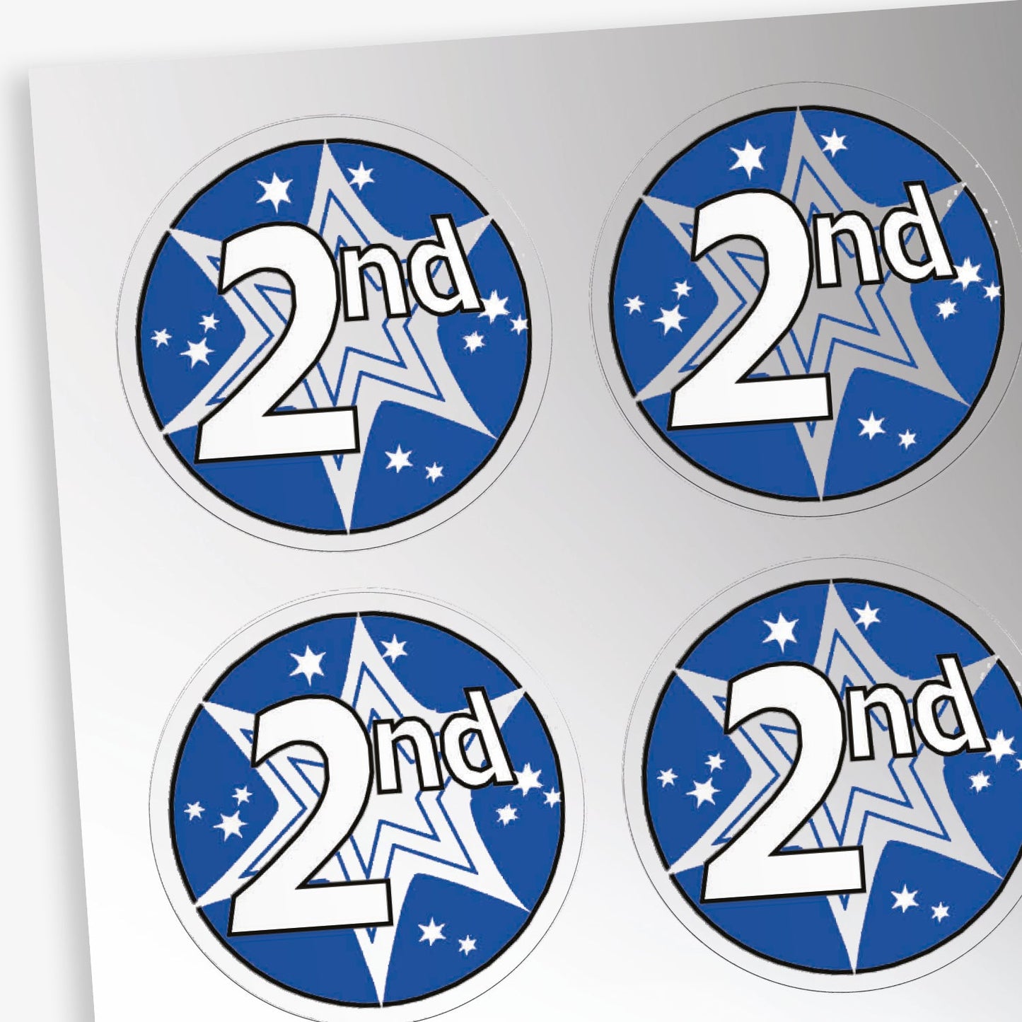 A sheet of metallic silver stickers with a blue and silver starburst behind a white font '2nd'.