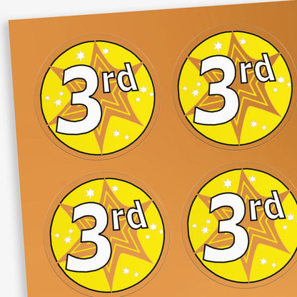 A sheet of metallic bronze stickers with a bronze and yellow starburst behind a white font '3rd'.
