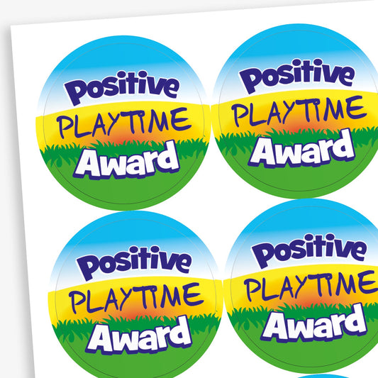 A sheet of circular stickers  saying 'Positive PLAYTIME Award' agains a sky and grass horizon background.