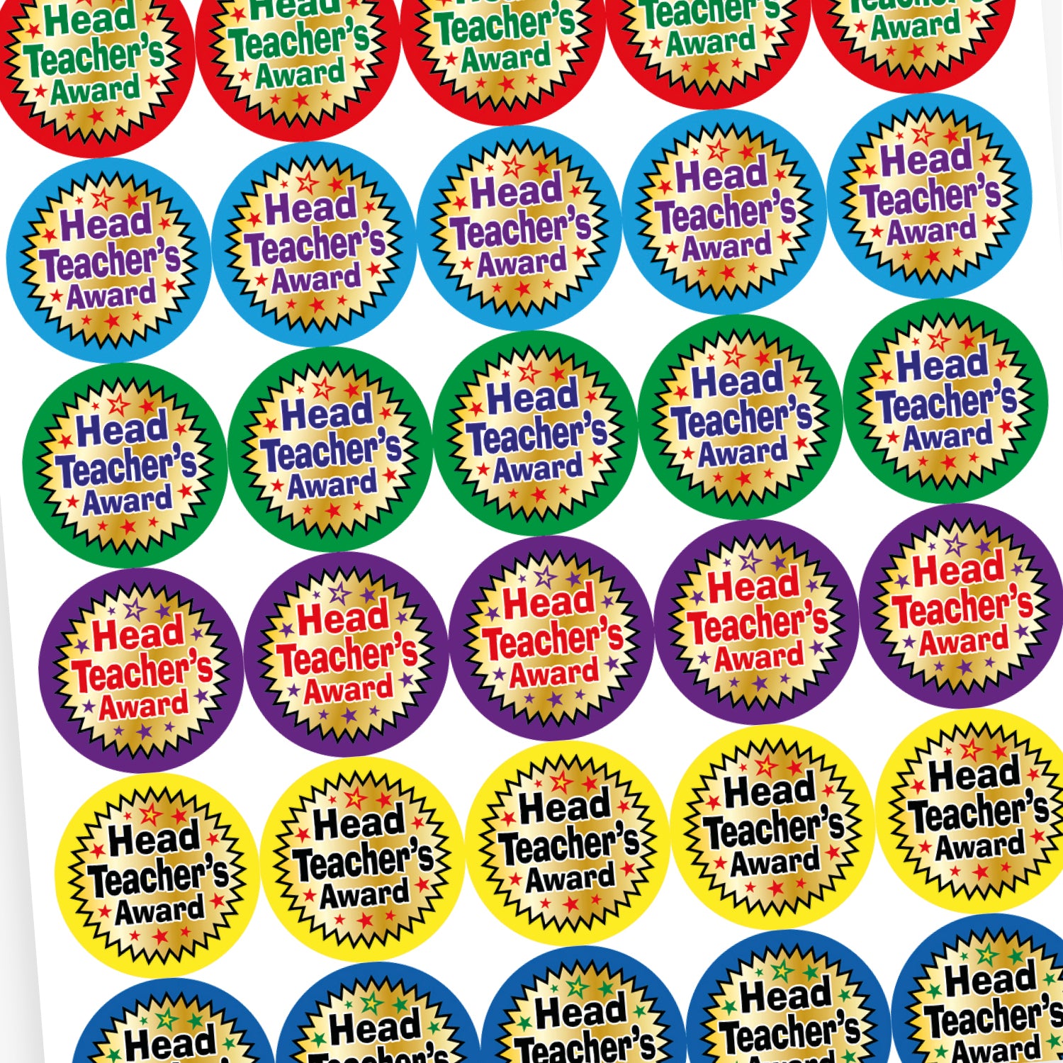 A sheet of colourful circular stickers with metallic finish, each stating 'Head Teacher's Award' in the centre.
