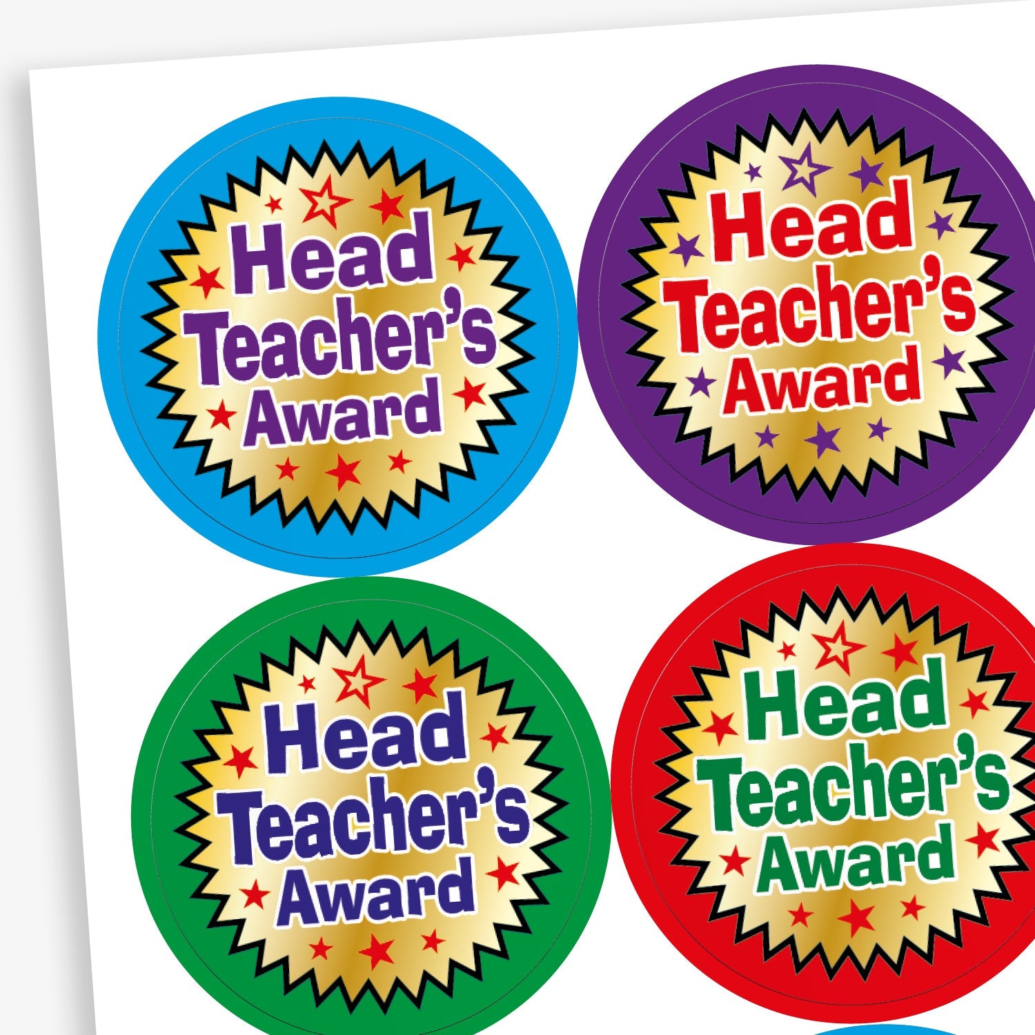 A set of colourful circular stickers with metallic finish, each stating 'Head Teacher's Award' in the centre.