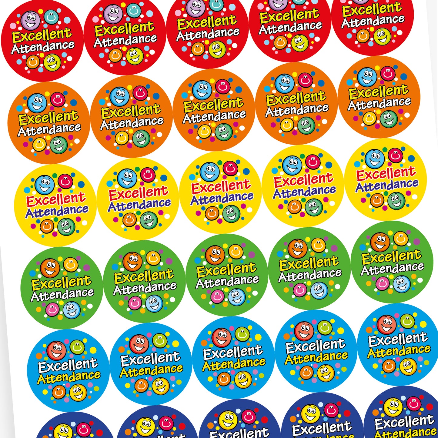 Overview of sheet of colourful circular stickers with smiley faces and the text 'Excellent Attendance'. The stickers are red, blue, orange, green, yellow and cyan each with different combinations of multicoloured smiley face icons and polka dots.