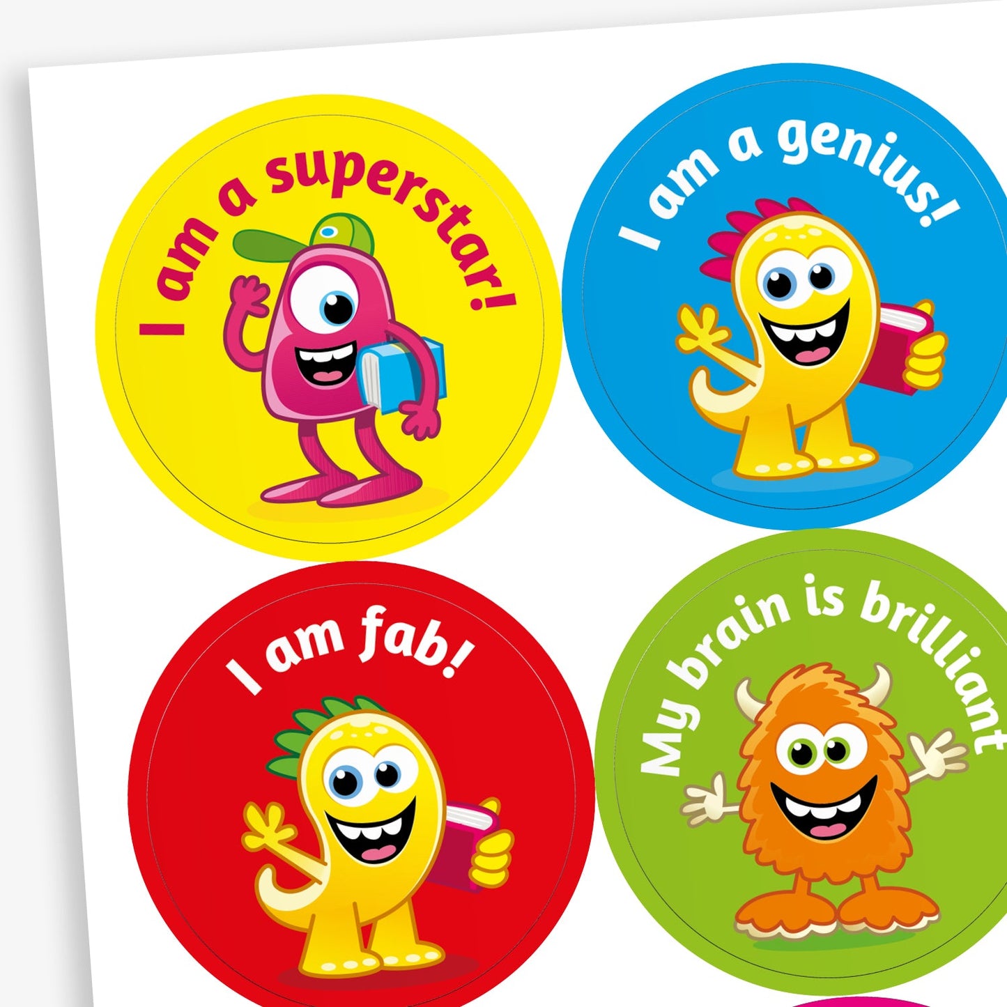 A sheet of vibrant round stickers, each with a monster as the main image and phrases such as 'I am a superstar!', 'I am a genius!', 'I am fab' and 'My brain is brilliant'.
