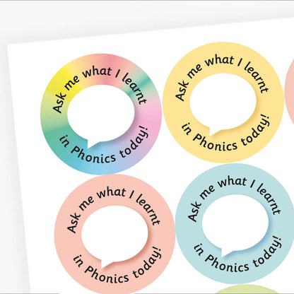 Four colorful circular stickers with text 'Ask me what I learnt in Phonics today!' on a white background.