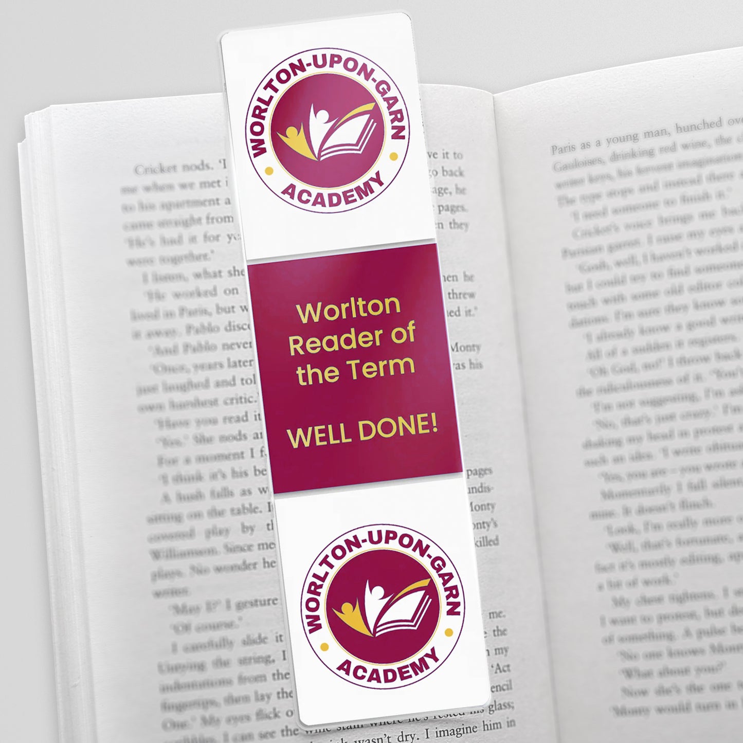 Acrylic bookmark with three photos uploaded vertically showing school logo and an award message centre.
