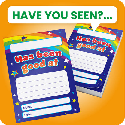 Reward pad with a dark blue background, rainbow arc, and colourful stars. The message reads '[Blank] has been good at [blank]' with space for comments, a signature, and date.