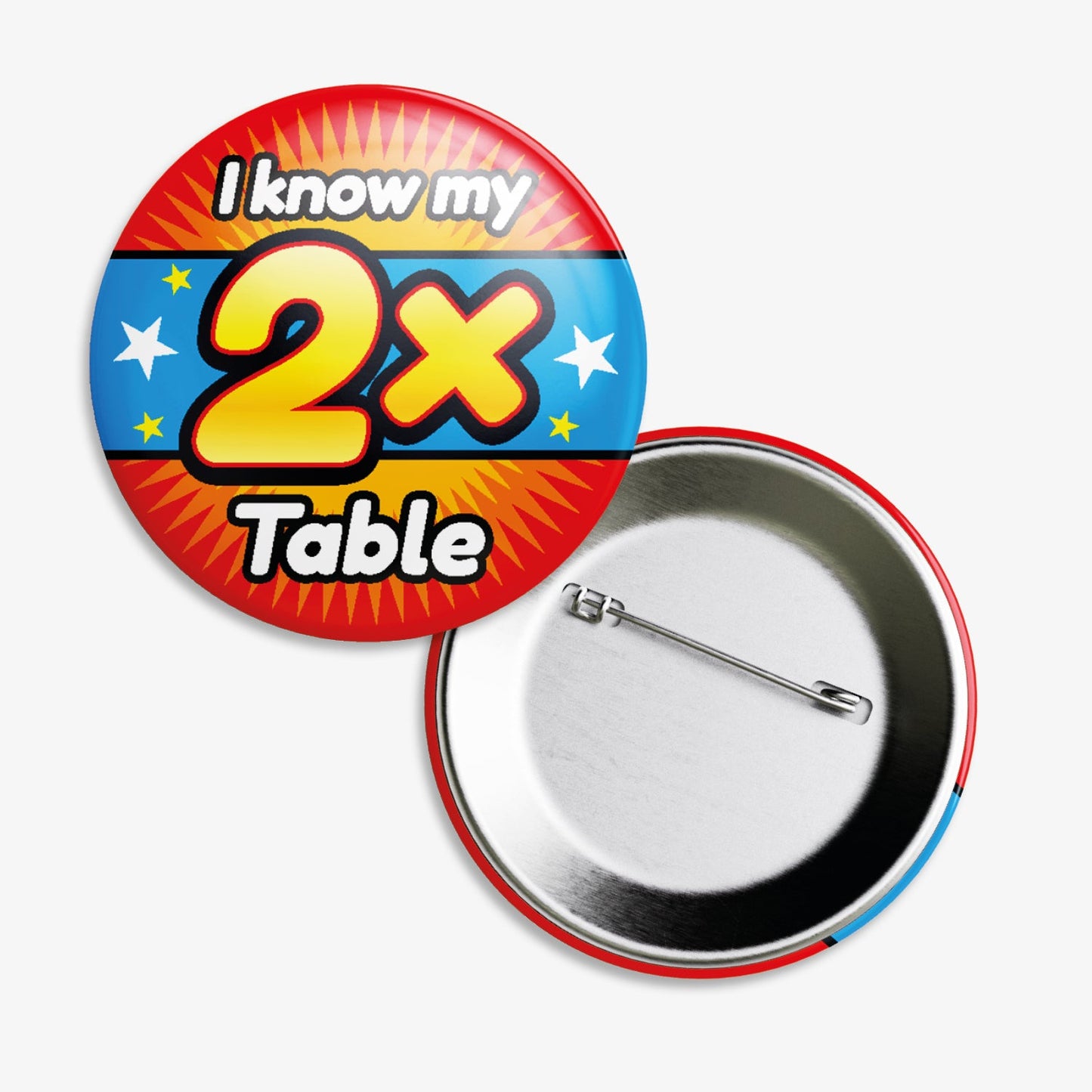 A 38mm circular badge with a vibrant cyan and red background, featuring the bold white text 'I know my' above a large yellow '2x' and the word 'Table' below, accented by white stars on either side.