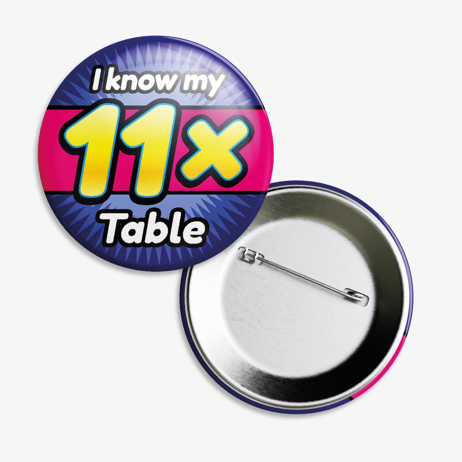 A 38mm circular badge with a vibrant magenta and blue background, featuring the bold white text 'I know my' above a large yellow '11x' and the word 'Table' below, accented by white stars on either side.