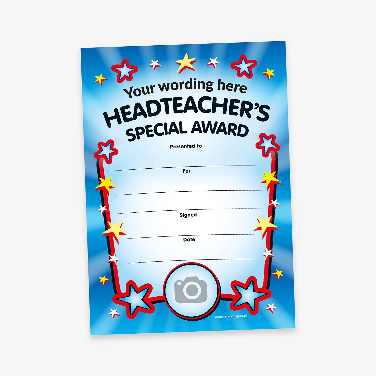 A bright 'Headteacher’s Special Award' certificate with a blue background and radiant light burst effect. The top reads 'Your wording here' followed by 'HEADTEACHER’S SPECIAL AWARD' in bold black letters. The certificate is framed with red and yellow cartoon stars, and includes blank lines for 'Presented to', 'For', 'Signed', and 'Date'. A round camera icon at the bottom centre indicates space for a custom photo.