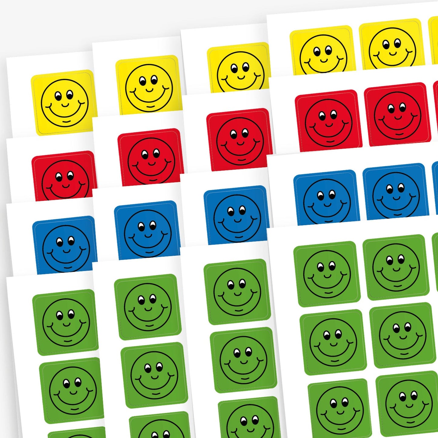 Sheets of square reward stickers with background colours of yellow, red, blue and green.  Each sticker has a main image of a black outlines smiling face.