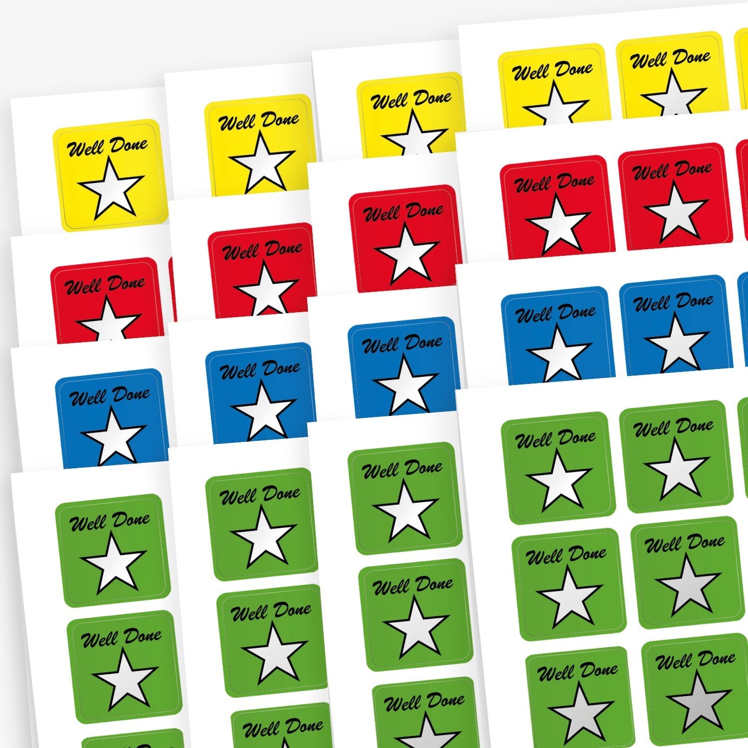 Sheets of square reward stickers with background colours of yellow, red, blue and green.  Each sticker has a main image of a silver star and the wording 'Well Done' above.
