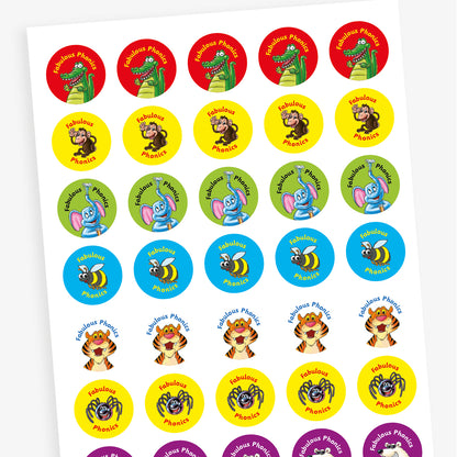 Overview of a sheet of circular stickers each with the phrase 'Fabulous Phonics'against various bright coloured backgrounds and images including: a bee, crocodile, elephant, spider, monkey, polar bear and a tiger.