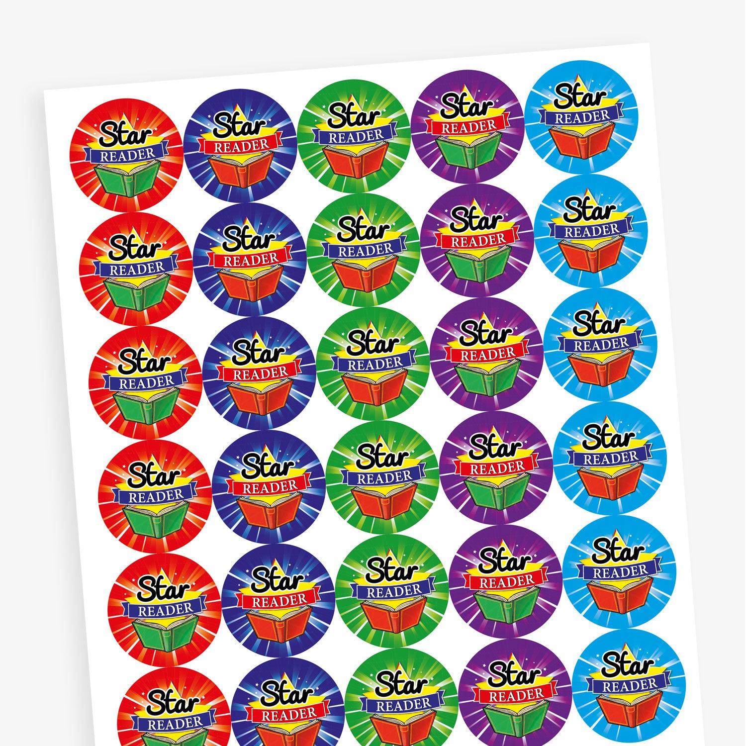 Overview of a sheet of circular reward stickers with the phrase 'Star Reader' in bold black and white text over a red and blue banner. Each sticker features a colourful open book and a tie-dye style background in various bright colours such as blue, green, red, purple, and orange.
