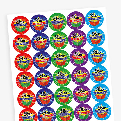 Overview of a sheet of circular reward stickers with the phrase 'Star Reader' in bold black and white text over a red and blue banner. Each sticker features a colourful open book and a tie-dye style background in various bright colours such as blue, green, red, purple, and orange.