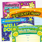 Assortment of A5 Headteacher's Award certificates in various vibrant designs, each featuring bold titles such as 'Headteacher's Award', 'Headteacher's Special Award', and 'Headteacher's Gold Award'. The certificates display colourful backgrounds with star motifs and include spaces for 'Presented to', 'For', 'Signed', and 'Date' entries, designed to celebrate and acknowledge pupil achievements.