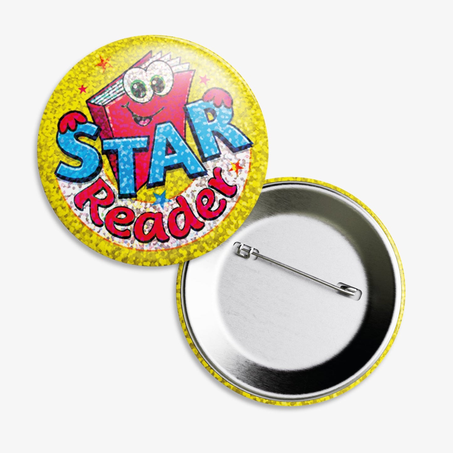 A set of ten 38mm round metal badges with a holograpic background; featuring a smiling cartoon book character with large eyes, set against a gold and silver background, displaying the phrase 'Star Reader' in bold blue and red text; designed to reward and motivate pupils for their reading achievements