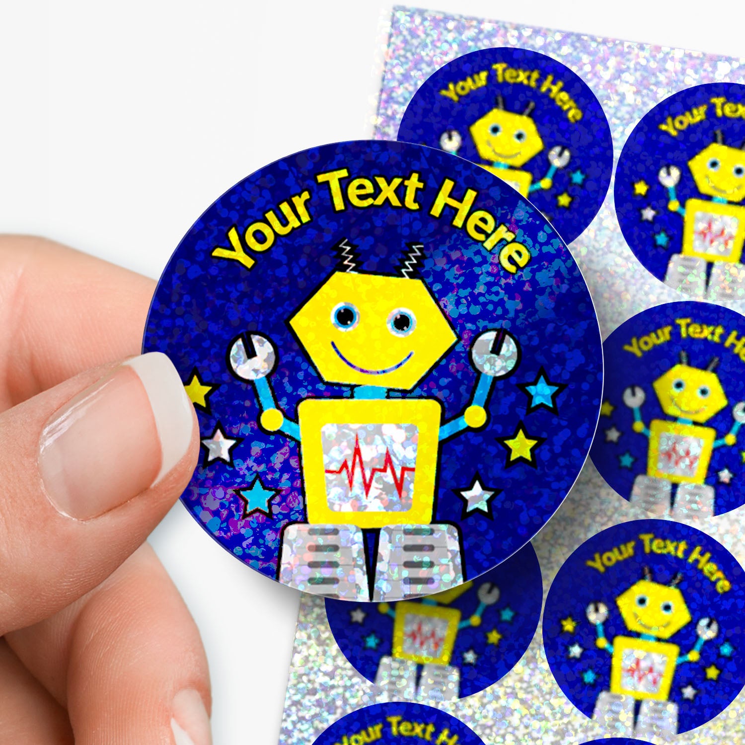 Sticker with robot design and customisable text, held by a hand.