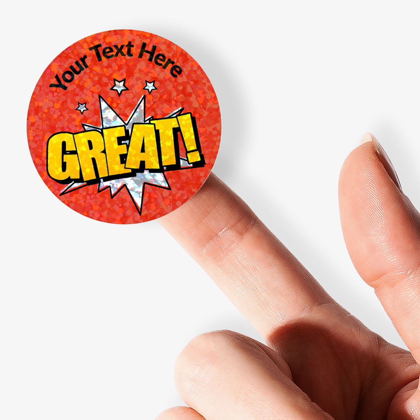 Personalised holographic round red sticker with 'GREAT!' text held by a finger.