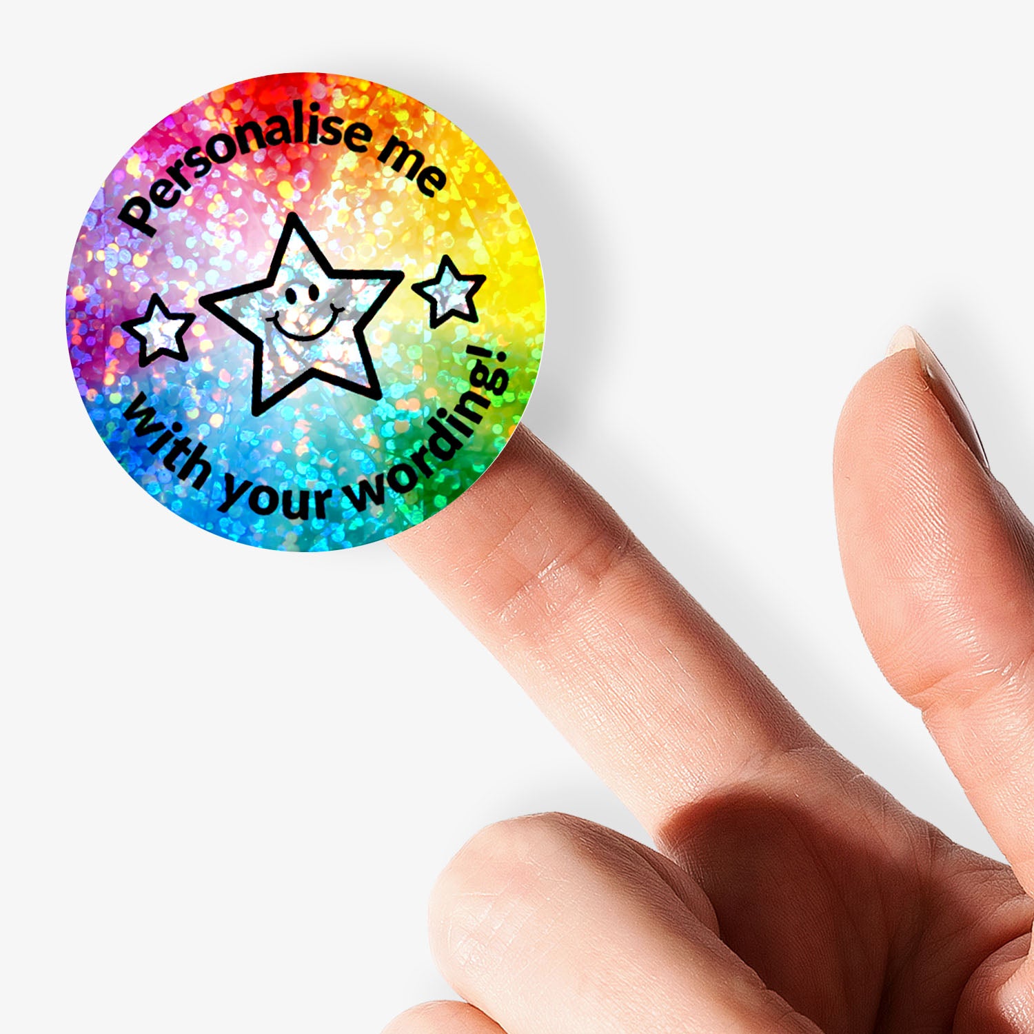Personalised holographic yellow sticker with text 'Personalise me with your wording!' held by a finger.