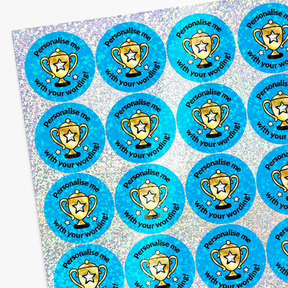Personalised holographic stickers with trophy designs and text on a blue background.