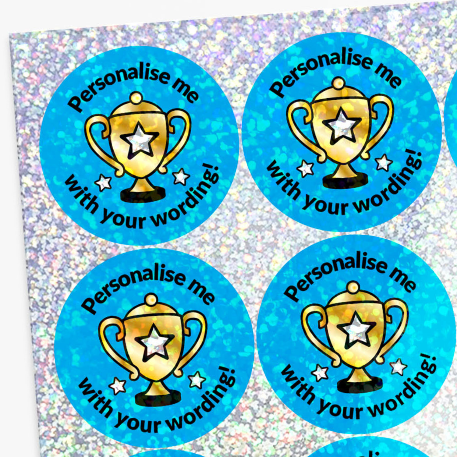 Round blue stickers with gold trophies and text on a glittery background