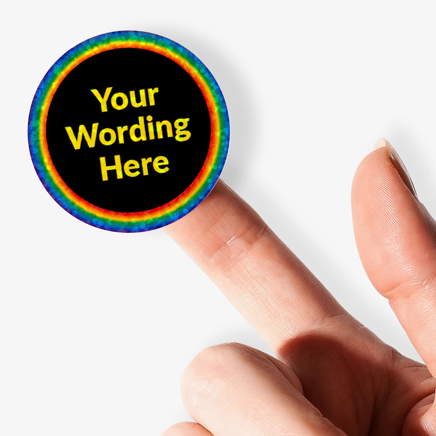 personalised holographic round sticker with rainbow border and customizable text held by a finger