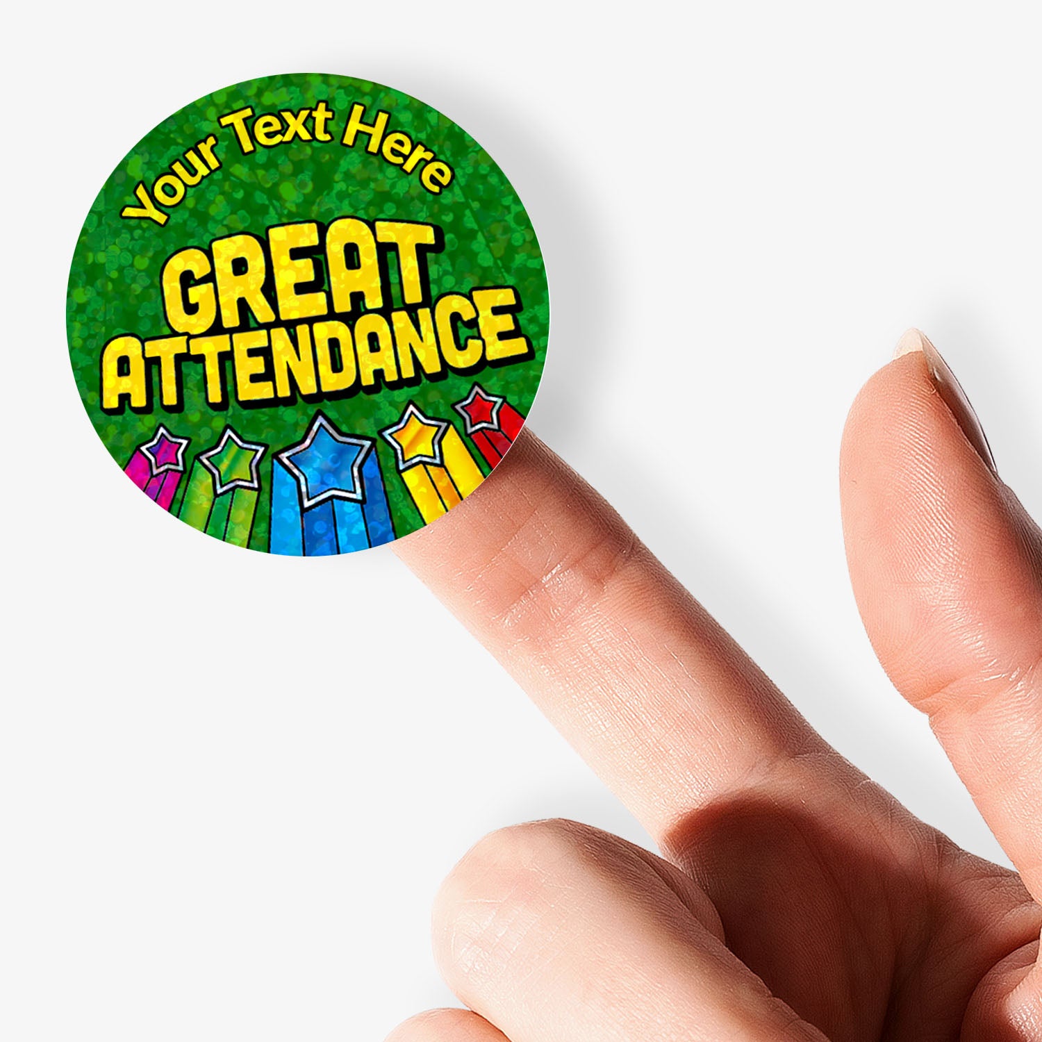 Colorful personalised holographic 'Great Attendance' sticker held by a finger.