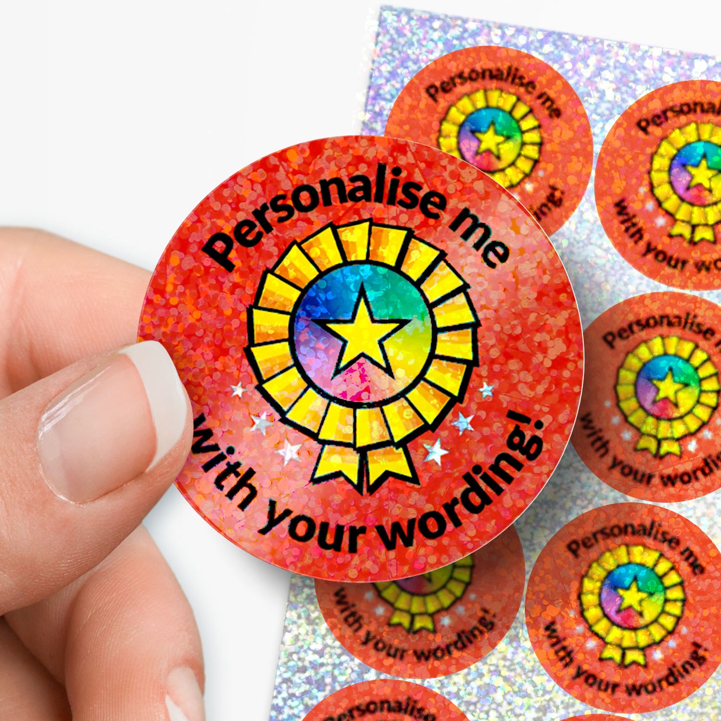 Round customizable sticker with colorful design and text held by a hand