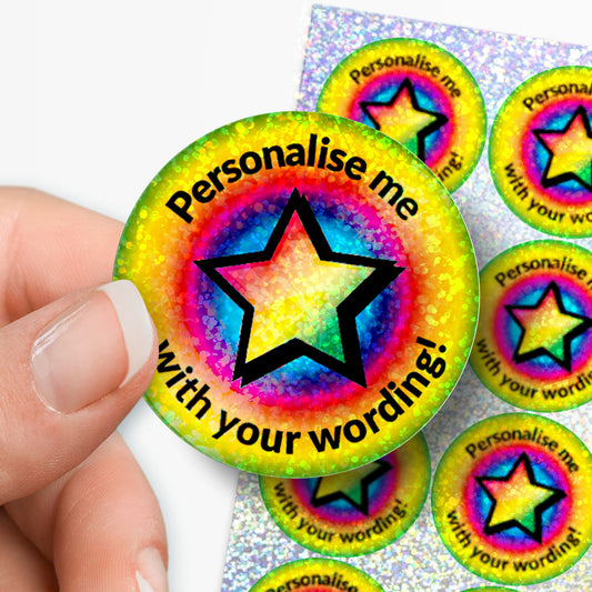 Colourful star-shaped stickers with text 'Personalise me with your wording!' held by a hand.