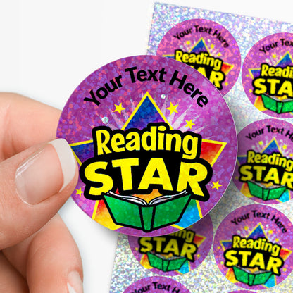 Colorful 'Reading STAR' stickers with customisable text held by a hand.