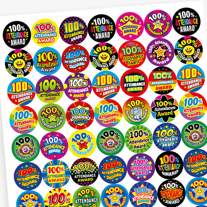 A sheet of 25mm round stickers celebrating 100% attendance. Each sticker features bold, colourful designs with the text '100% Attendance Award' in various fonts and backgrounds, including stars, smiley faces, and vibrant patterns. Ideal for rewarding pupils' perfect attendance.