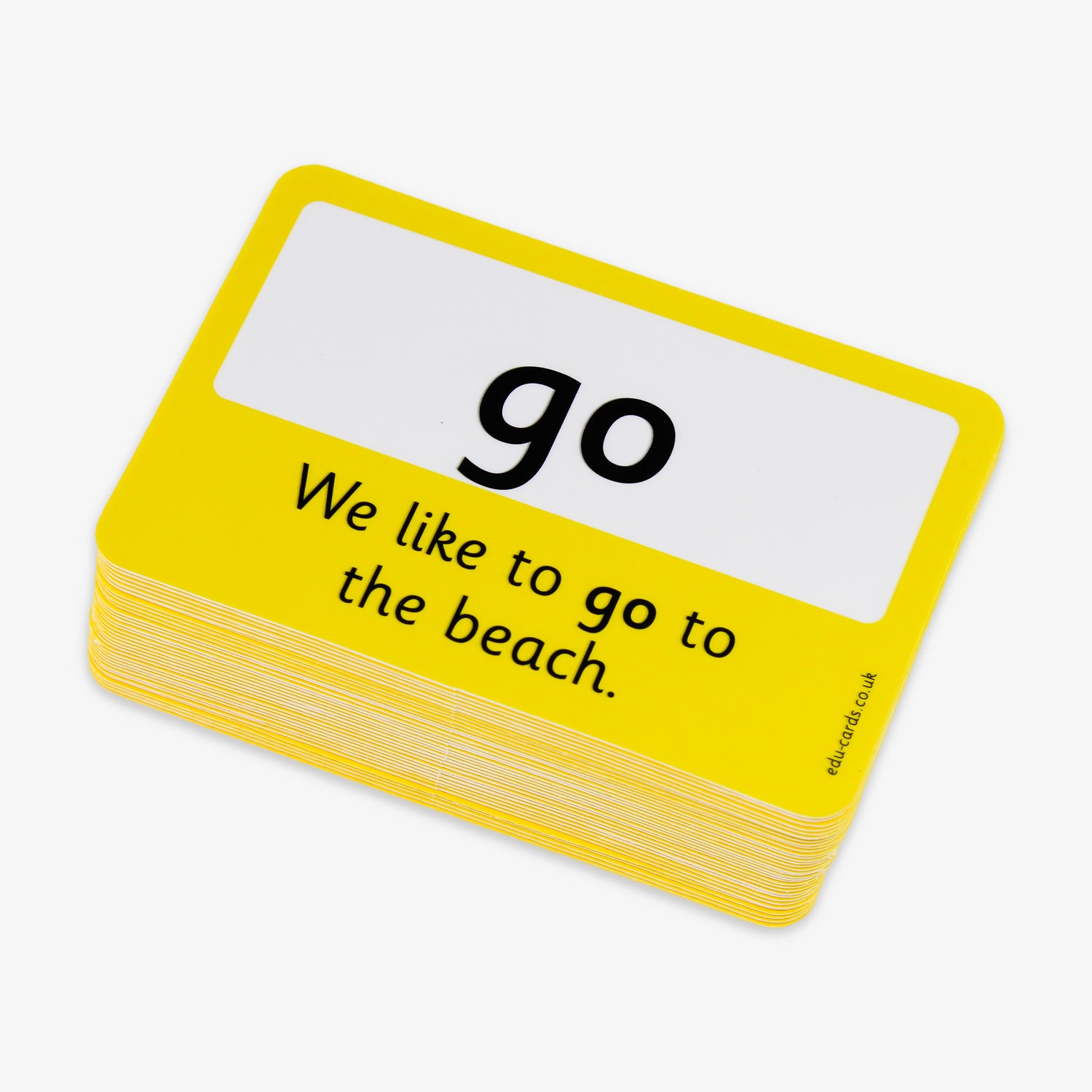 A set of 100 laminated flashcards, each measuring 86mm by 54mm, featuring high-frequency English words in large, clear black text on a white background; designed to support early literacy development by enhancing word recognition and reading fluency in educational settings