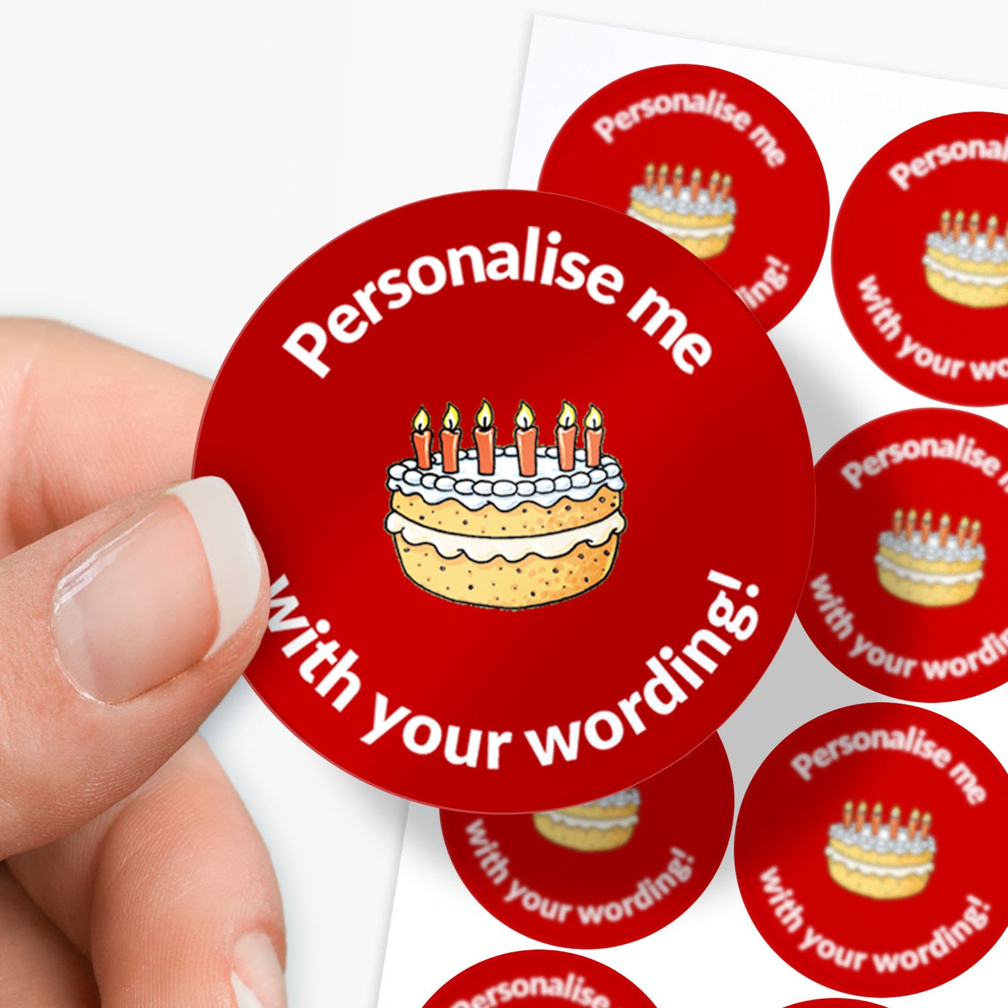 Red stickers with a birthday cake as the central image.  Space for personalisation above and below the image.