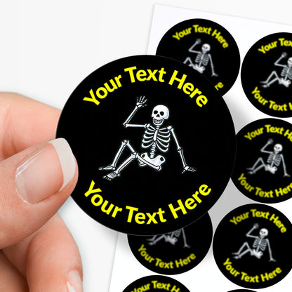 Circular stickers with a skeleton design and customizable text, held by a hand.