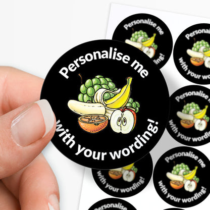 Round customizable sticker with fruit design and text 'Personalise me with your wording!' held by a hand.