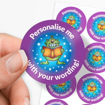 Sticker with a cartoon character and text 'Personalise me with your wording!' held by a hand.