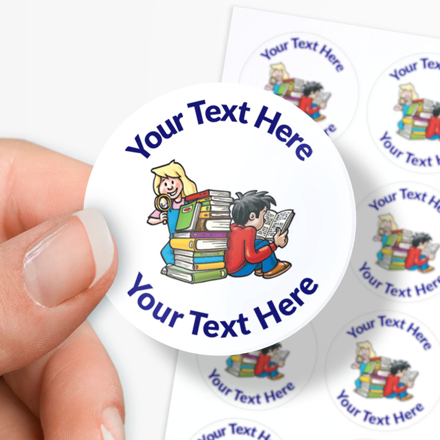 Personalisable sticker with cartoon characters and text area, held by a hand.
