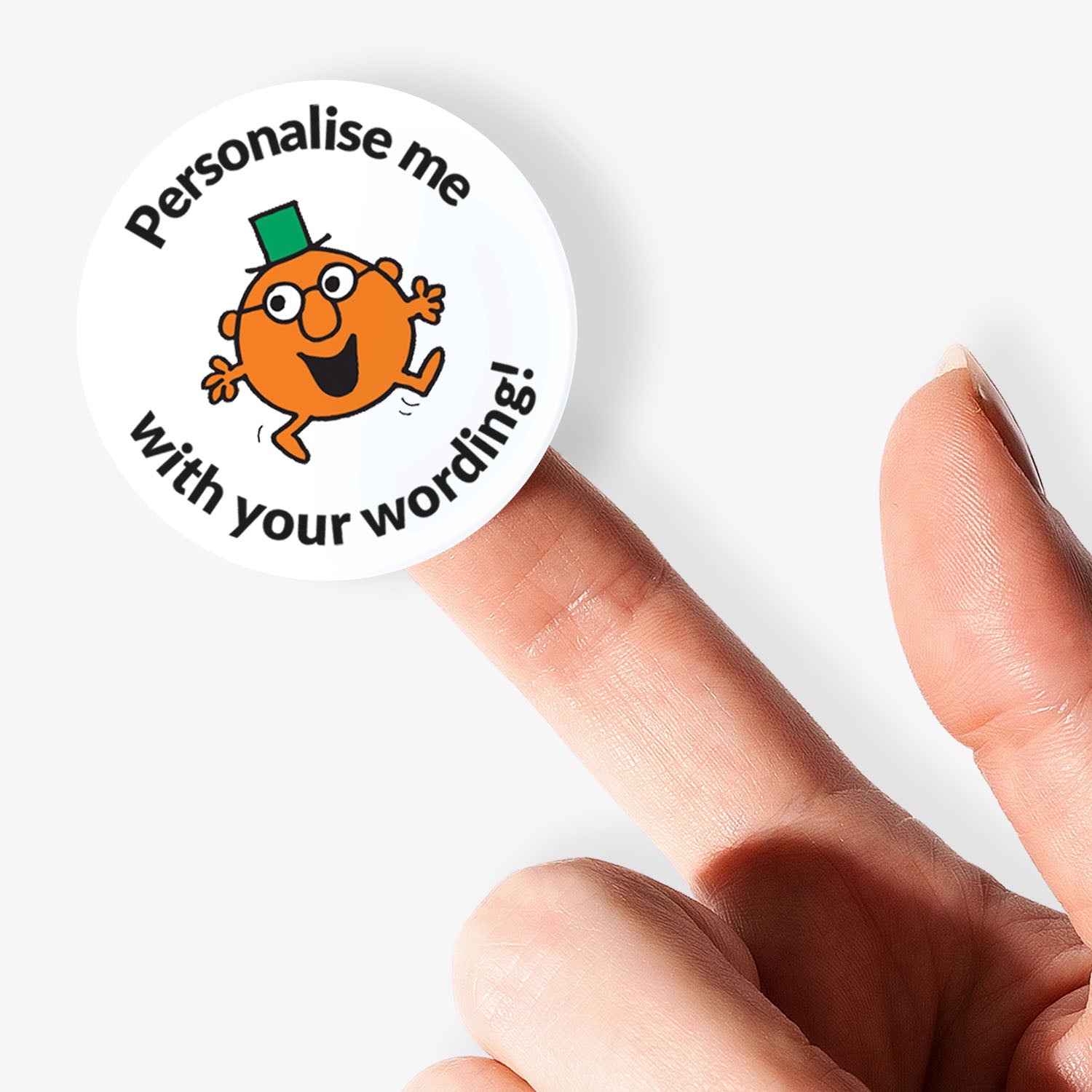 Circular sticker with Mr Men character and text 'Personalise me with your wording!' held by a finger.