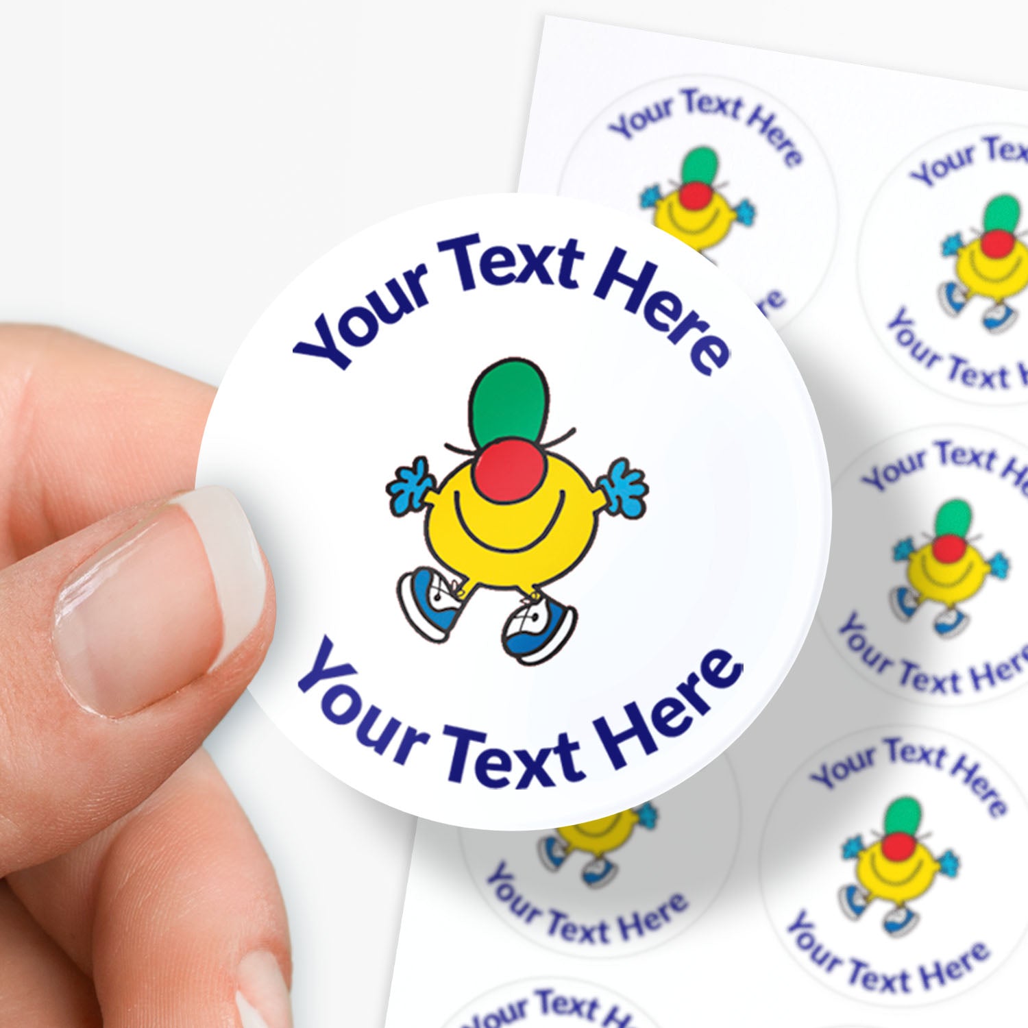 Personalisable stickers with a Mr Men character and customisable text held by a hand.